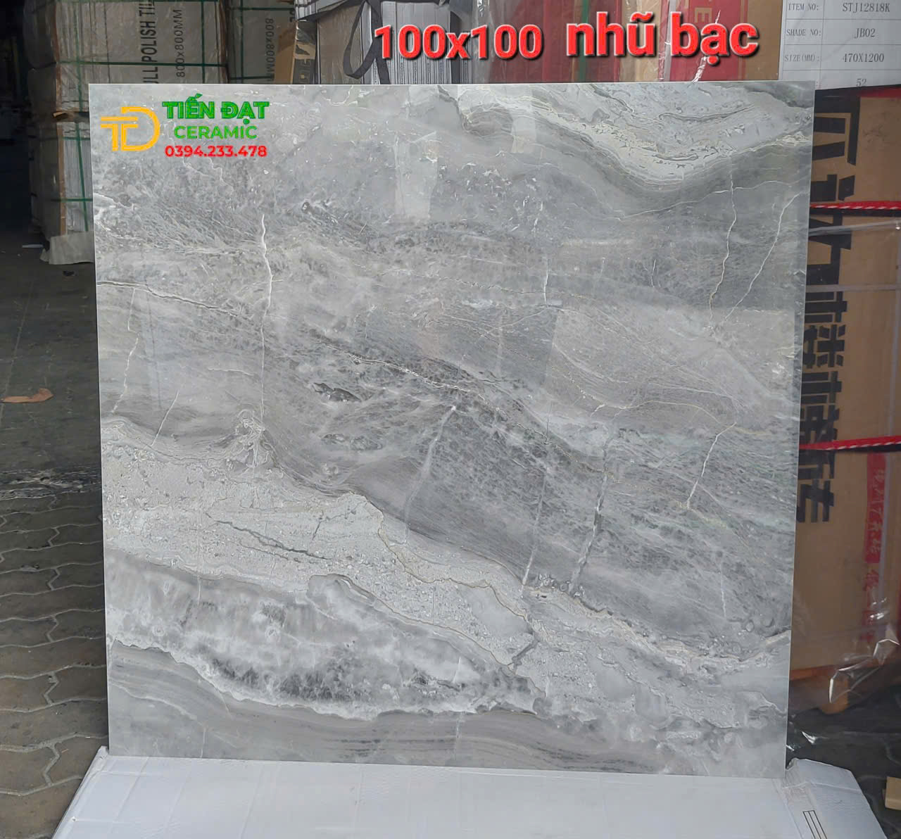 Gạch Vân Xám 100x100 Nhũ Bạc Ốp Lát Nhà Hàng Quầy Tiếp Tân