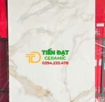 Đá Bóng Kiếng Kim Cương 60x120 TQ Trắng Vân Vàng