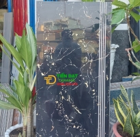 Gạch Ốp Lát Cầu Thang 47x120 Đen Vân Cam Mẫu Mới